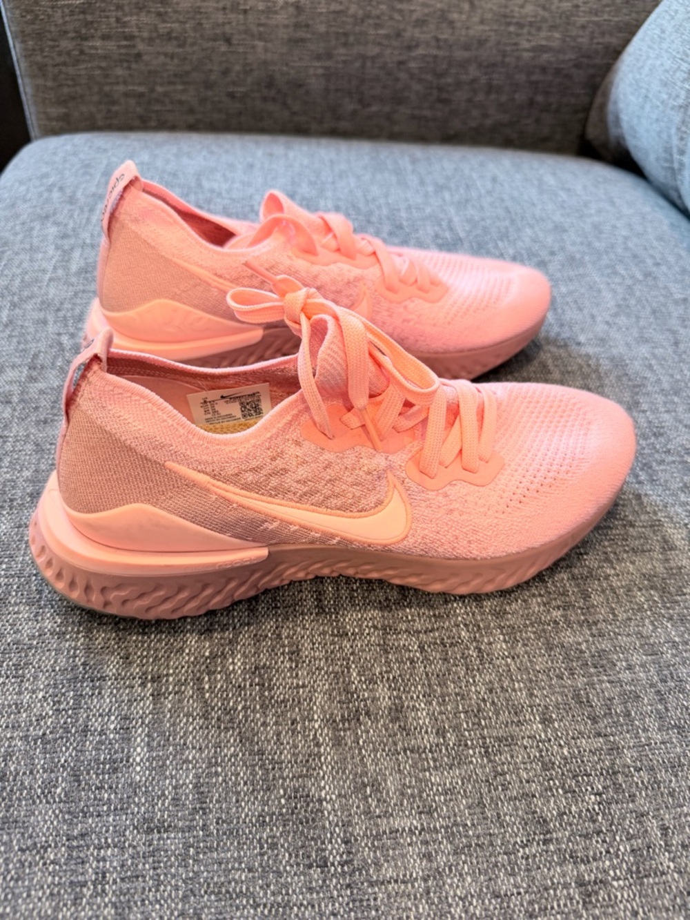 Nike Women's Pink Flyknit Running Sneakers
